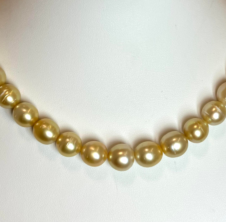 南洋ゴールデンパールリング 14.00mm 0.69ct K18 11.9gの買取実績｜色 